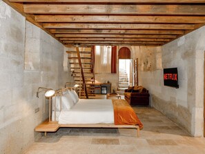 Duplex Cave Suite | Living area | 43-inch flat-screen TV with digital channels, TV, heated floors