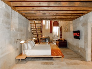 Duplex Cave Suite | Living area | 43-inch flat-screen TV with digital channels, TV, heated floors