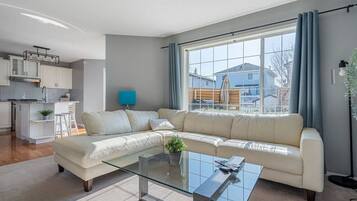 Smart TV, fireplace, books, offices