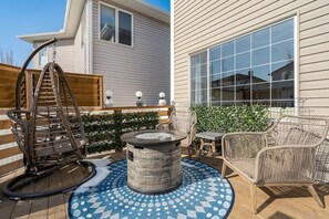 Terrace/patio - The Highland | Fenced Yard | Gym | Office | Pets (Calgary)