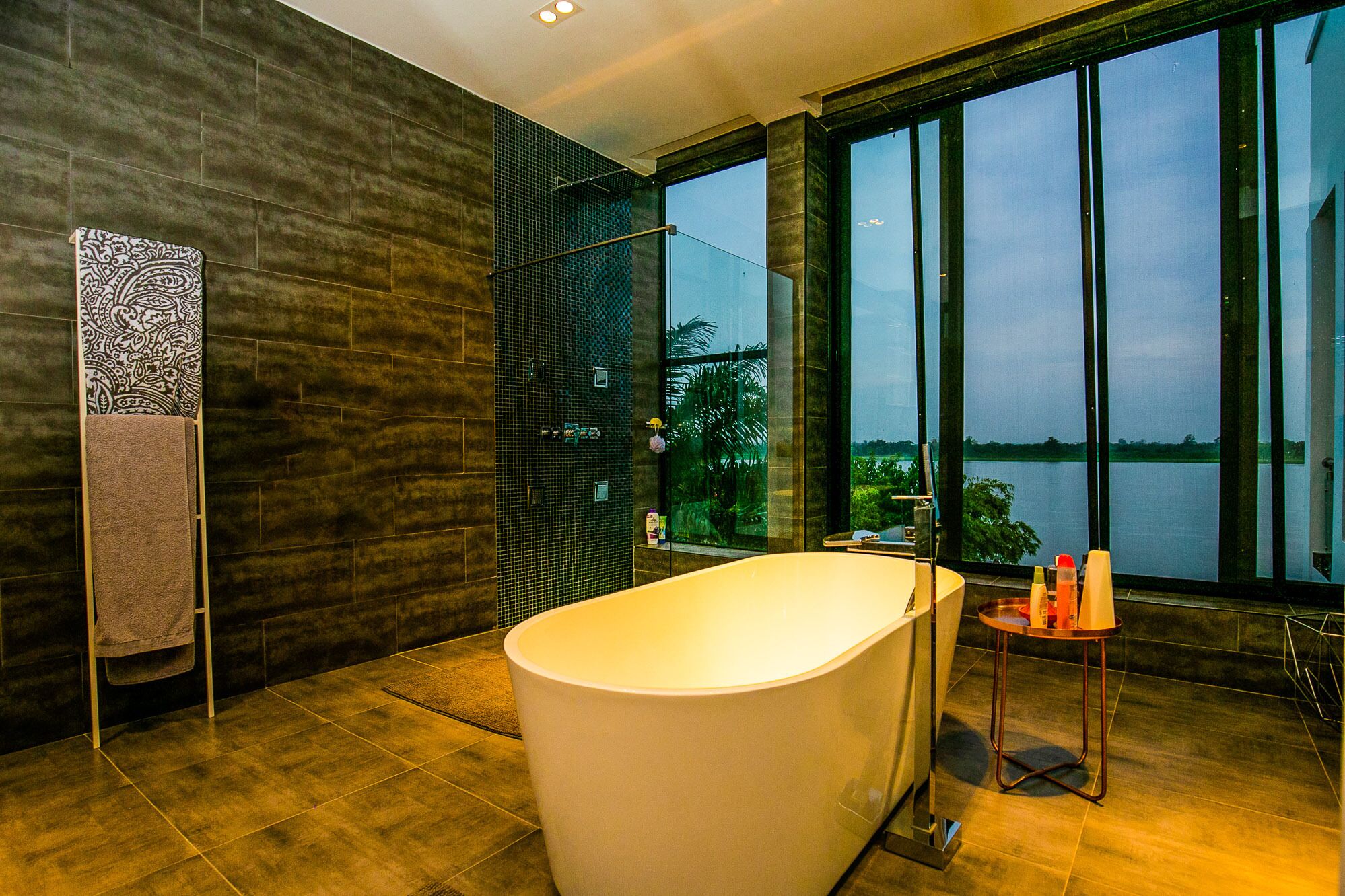 Bathtub, towels, soap, toilet paper