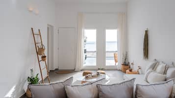 Deluxe Villa, 3 Bedrooms, Pool View, Beachside | Living area | 42-inch Smart TV with digital channels, TV, Netflix