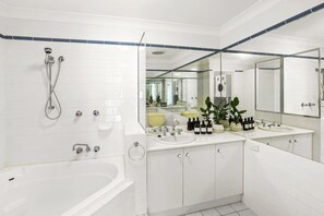 Bathtub, hair dryer, towels
