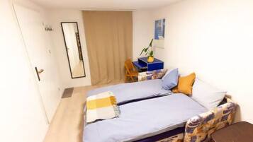 2 bedrooms, desk, iron/ironing board, travel cot