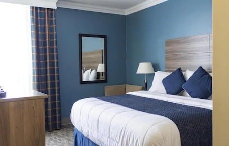 1 bedroom, desk, iron/ironing board, Internet. King Bed Standard View