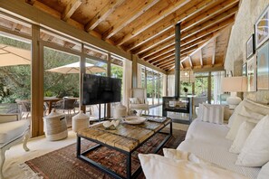 A spacious living area with a large TV, comfortable seating, and a fireplace. - VILLA CASA DEL TALAIOT SENCELLES VT/1743 (Sencelles)