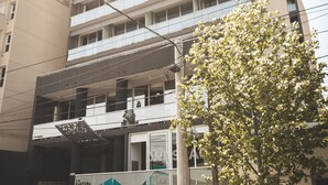 A multi-story building with a sign that reads "WON SPACE". - DFC COLIVING (Salta)