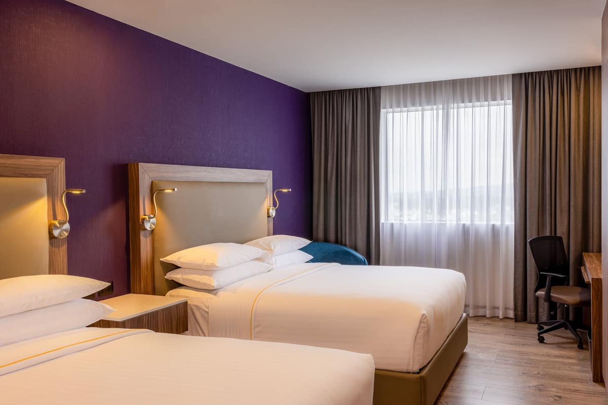 Premium bedding, down comforters, in-room safe, desk