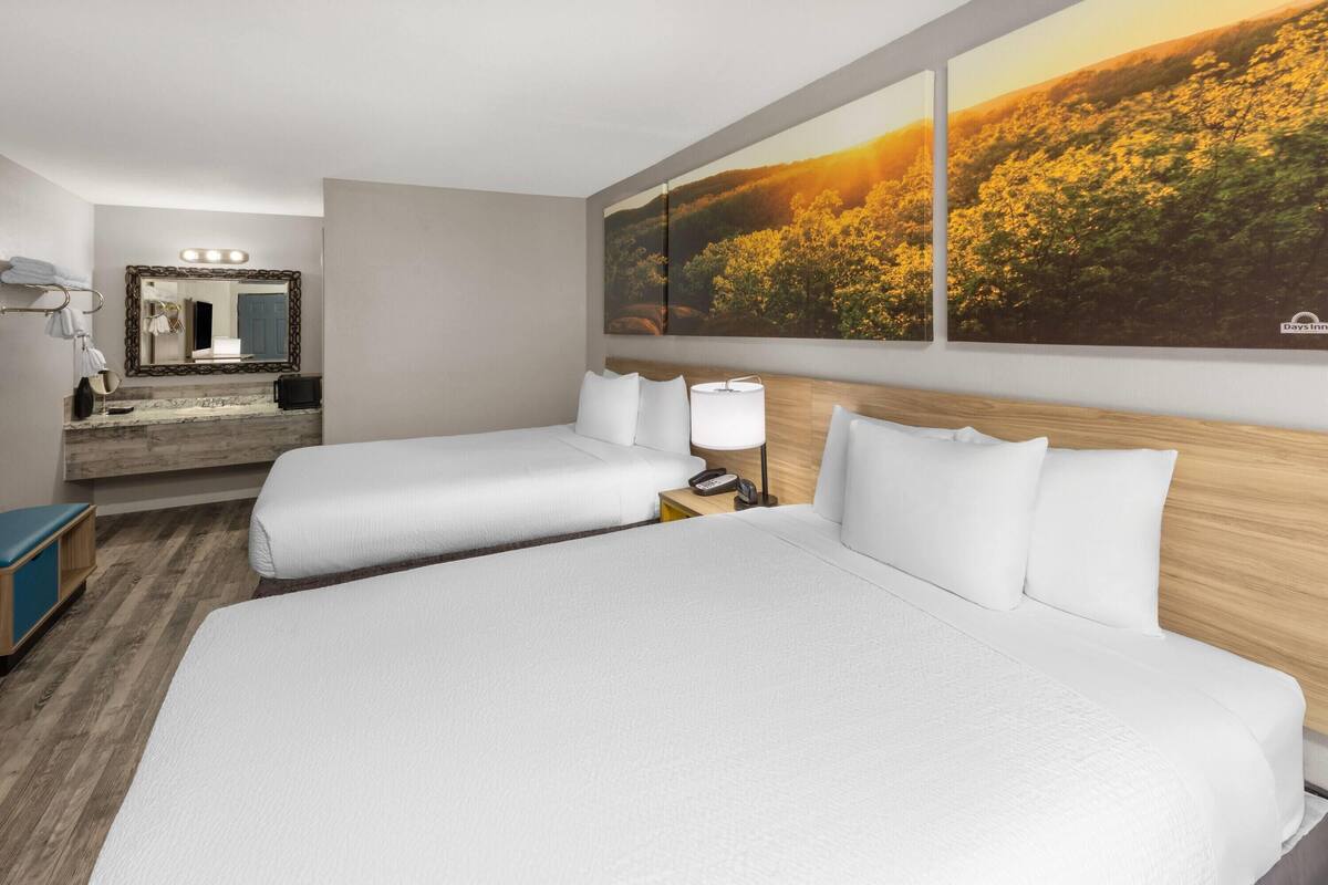 Room, 2 Queen Beds, Non Smoking | In-room safe, WiFi (free), individually decorated
