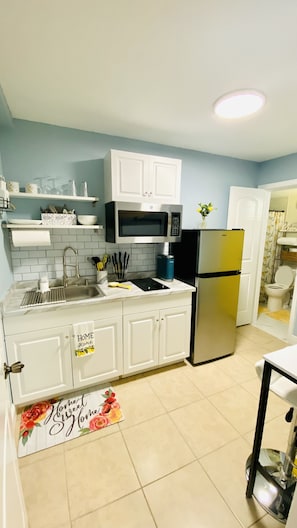 Microwave, stovetop, coffee/tea maker, toaster