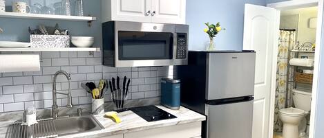 Microwave, stovetop, coffee/tea maker, toaster