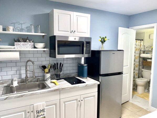Microwave, stovetop, coffee/tea maker, toaster