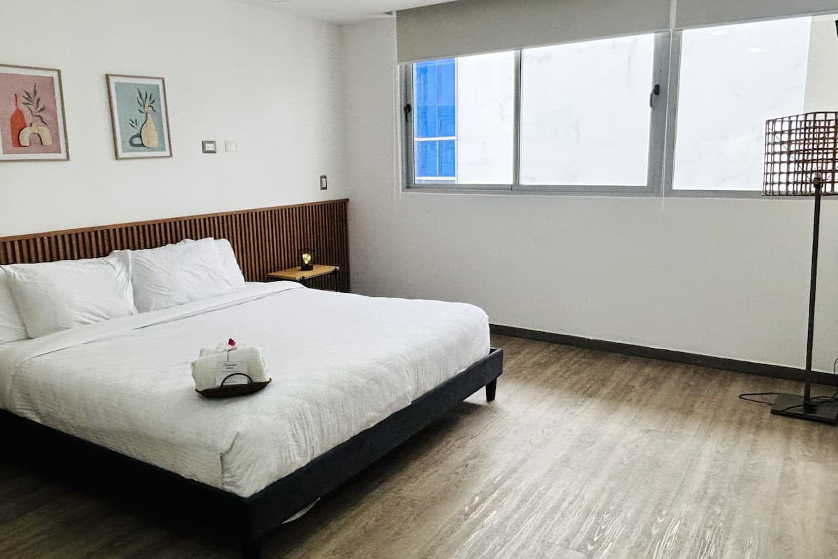 Apartment, 3 Bedrooms | Laptop workspace, blackout drapes, iron/ironing board, WiFi (free)
