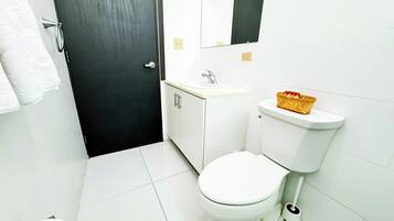 Basic Double Room Single Use | Bathroom | Shower, hair dryer, towels, soap