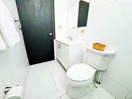 Basic Double Room Single Use | Bathroom | Shower, hair dryer, towels, soap