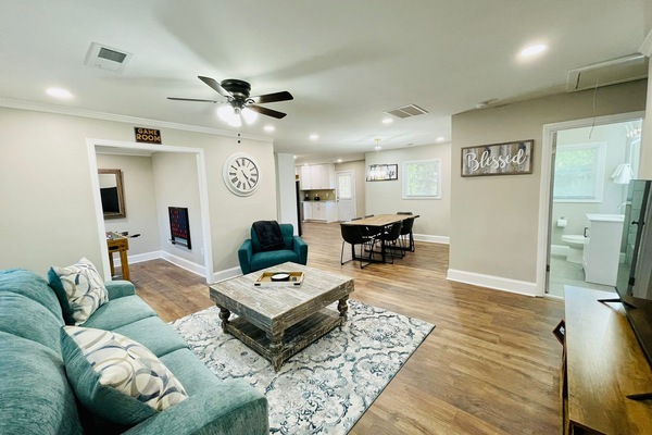 Relax, get comfortable and enjoy family and friend time in the large living room
