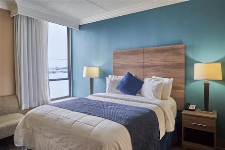 1 bedroom, desk, iron/ironing board, Internet. Queen Bed Standard View
