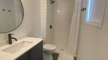 Combined shower/bathtub