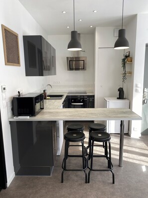 Fridge, microwave, coffee/tea maker