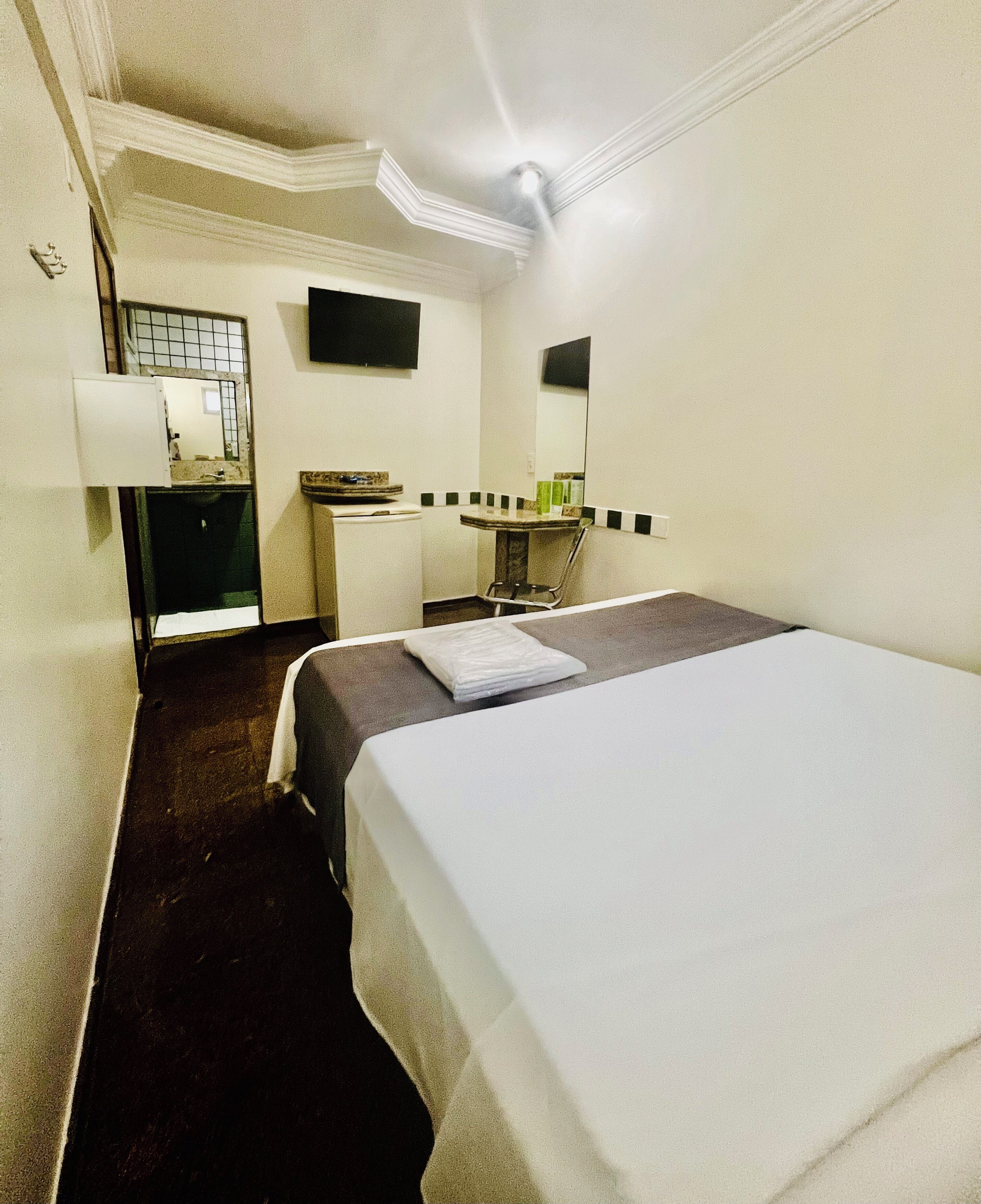 Chambre Simple Économique | Minibar, Wi-Fi gratuit, draps fournis