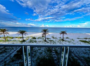 On the beach, sun-loungers