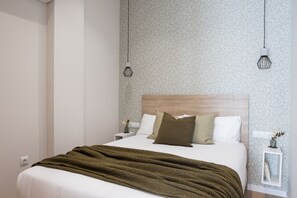 1 habitación, tabla de planchar con plancha, wifi gratis y ropa de cama 