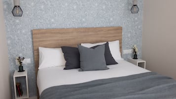 Tabla de planchar con plancha, wifi gratis, ropa de cama