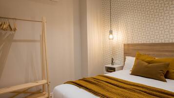2 dormitorios, tabla de planchar con plancha, wifi gratis y ropa de cama