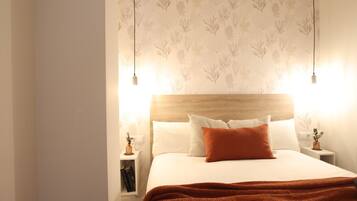 2 dormitorios, tabla de planchar con plancha, wifi gratis y ropa de cama