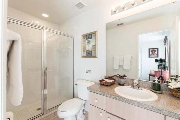 Combined shower/bathtub, hair dryer, towels, soap