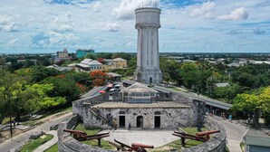 A historic fort with a central tower, cannons, and a paved courtyard. - Comfort Breeze Studio (Nassau)