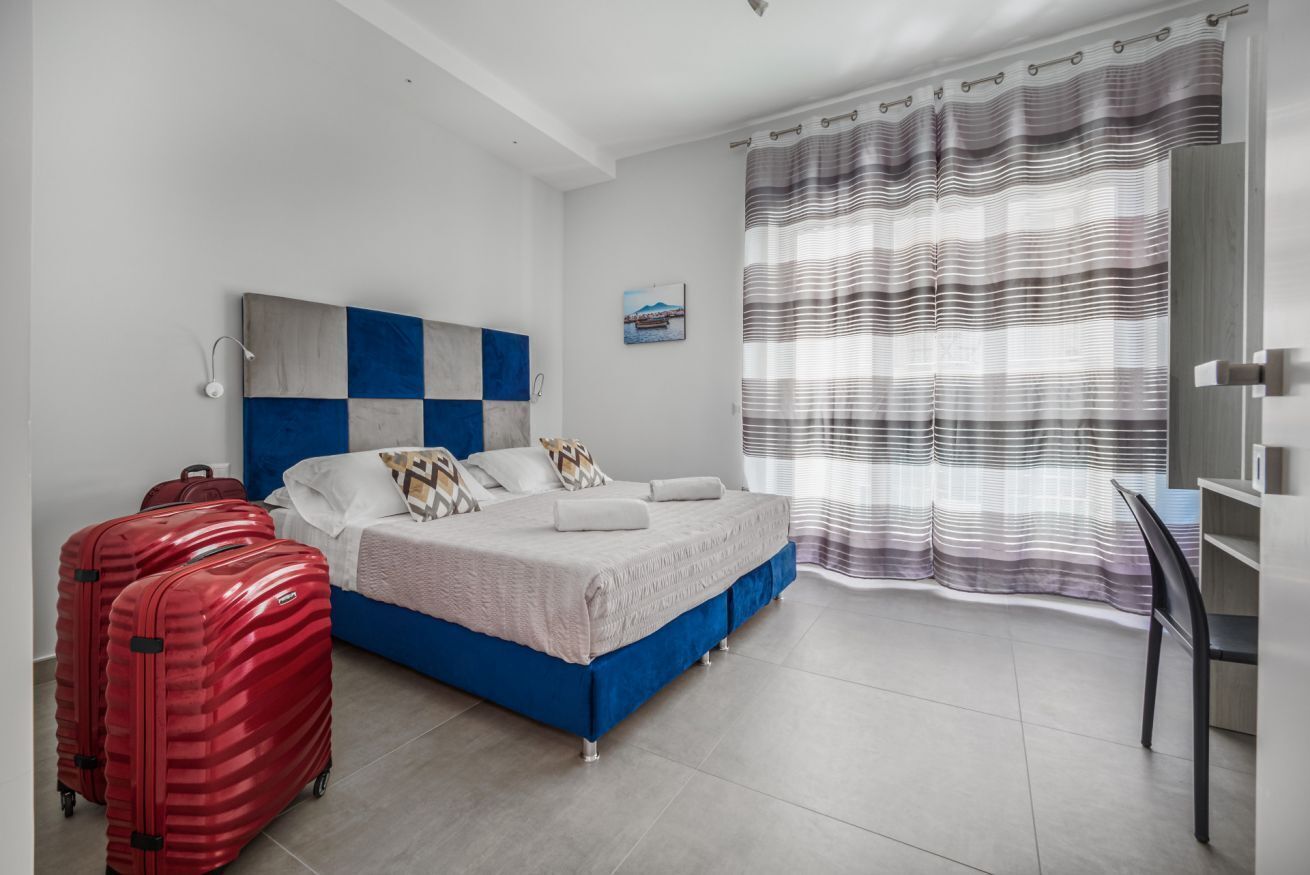 2 bedrooms, desk, iron/ironing board, travel crib