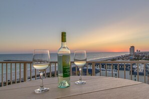 Outdoor dining - Calypso 1212 | Gulf & City Views | $323 Free Daily Activities! (Panama City Beach)