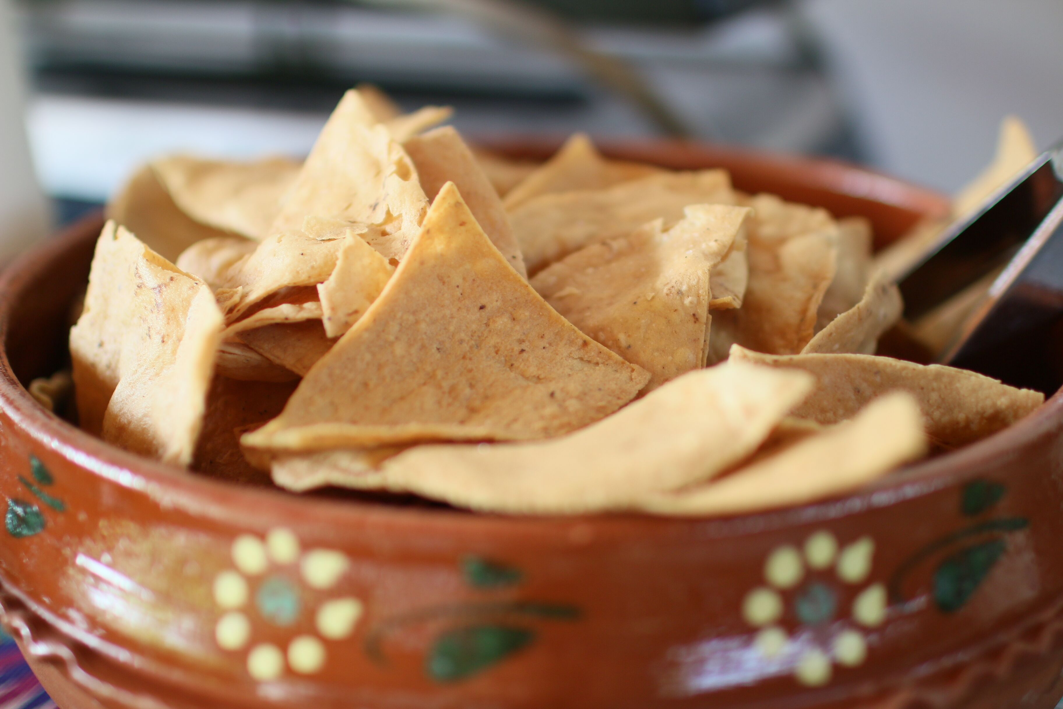 A bowl of tortilla chips.