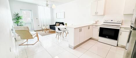 Fridge, microwave, cookware/dishes/utensils