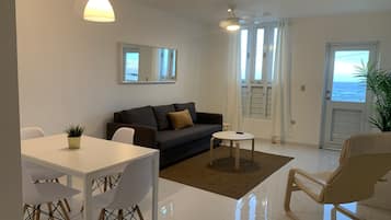 Habitación básica | Zona de estar | Una televisión