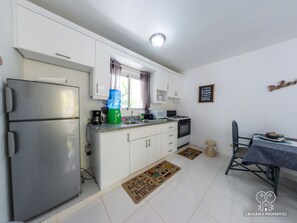 Microwave, coffee/tea maker, cookware/dishes/utensils