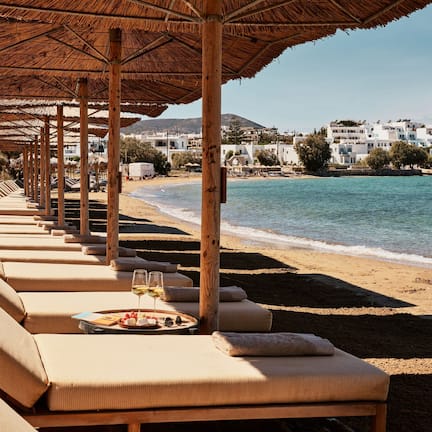 On the beach, sun loungers, beach umbrellas, beach towels