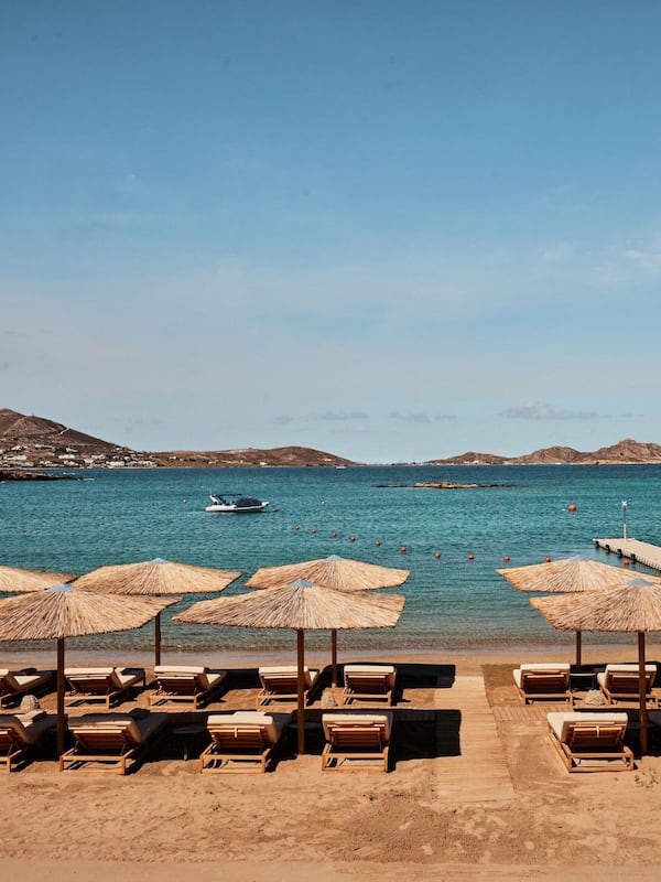 On the beach, sun loungers, beach umbrellas, beach towels
