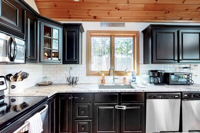 Fantastic lakefront escape with large deck, private dock, fast WiFi, & gas grill