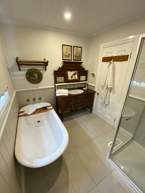 Bathtub, hair dryer, towels, soap