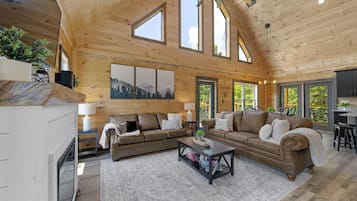 Smart-tv, een open haard, videospelletjes en een dvd-speler