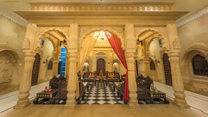 An ornate hall with a checkered floor, intricate arches, and a central chandelier. - The Jaigarh Palace Jaisalmer (Jaisalmer)