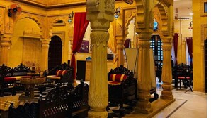 An ornate interior with high ceilings, chandeliers, and detailed arches. - The Jaigarh Palace Jaisalmer (Jaisalmer)