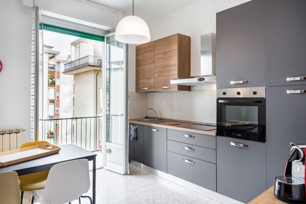 Fridge, stovetop, cookware/dishes/utensils