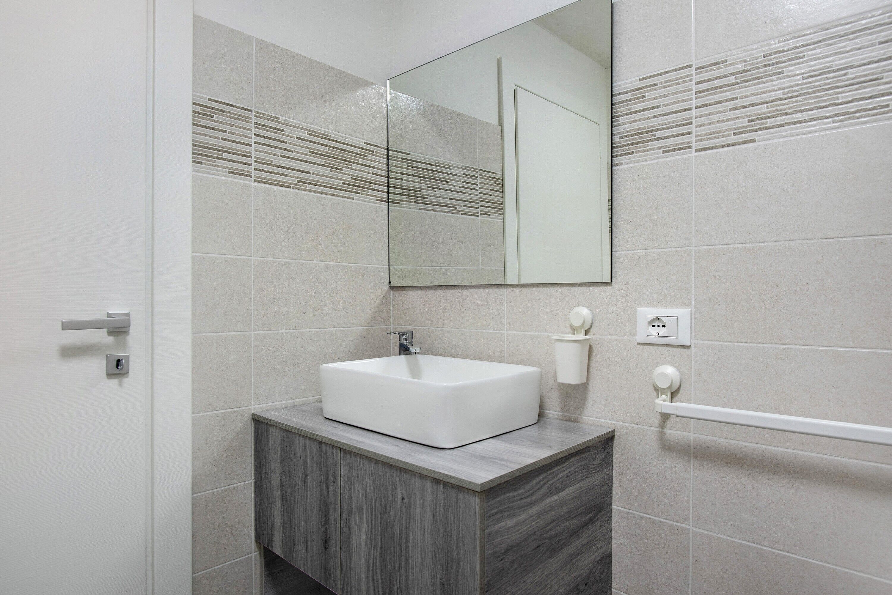 Doccia, asciugacapelli, asciugamani