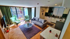 Apartment, Garden Area | 1 bedroom, minibar, free WiFi, bed sheets