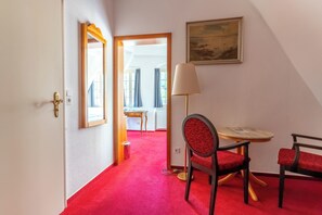 Junior Suite | 1 bedroom, in-room safe, individually decorated, desk