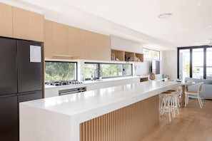 Coffee/tea maker, fridge, microwave, oven