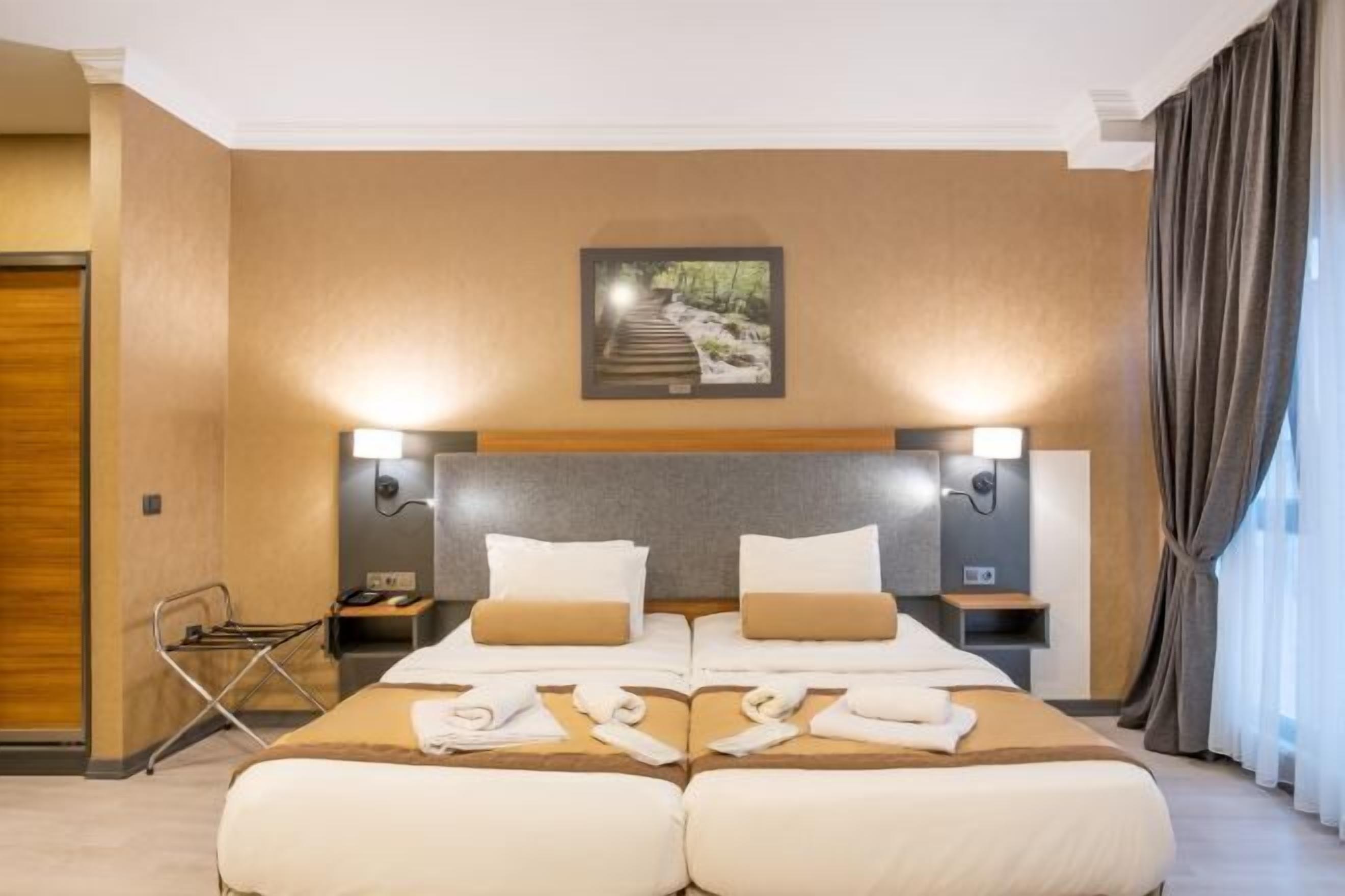 エジプト綿のシーツ、高級寝具、羽毛の掛け布団、ミニバー